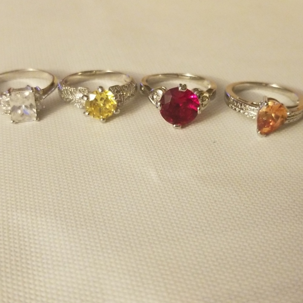 Lot of 4 rings,  costume sizes 6-7